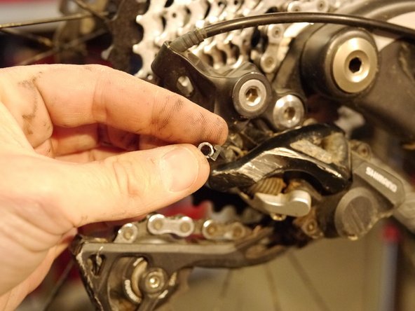 Be careful not to lose the small plastic washer