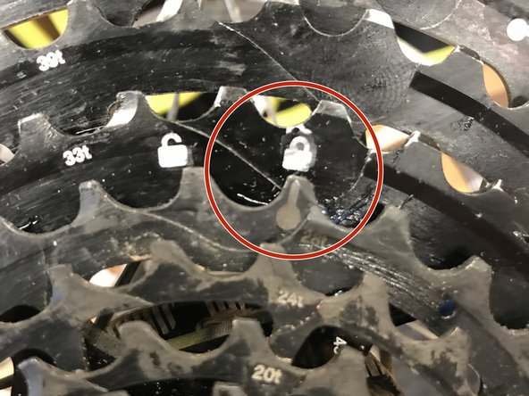 Line the key on the steel sprocket assembly up with the lock arrow on the aluminum cogs to ensure the two pieces are fully locked together.