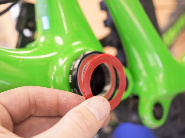 Install the outer seal by pressing it into the cup