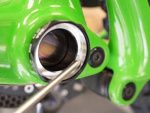 Lightly press a new 6806 bearing into the cup