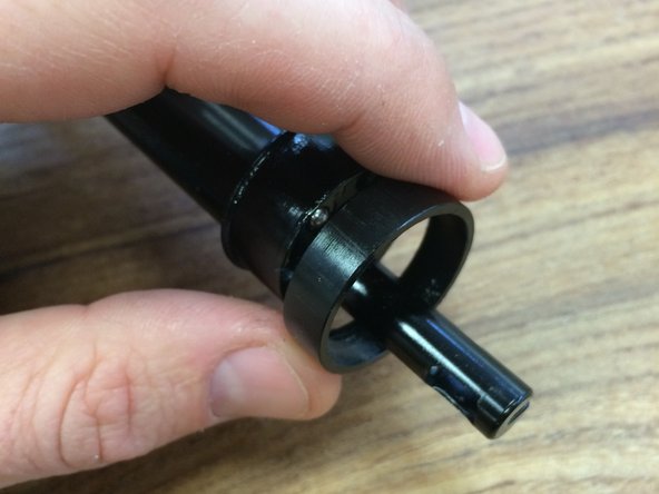 Slide the pillar bottom bushing on