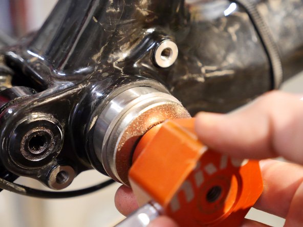 Place the tool over the cup