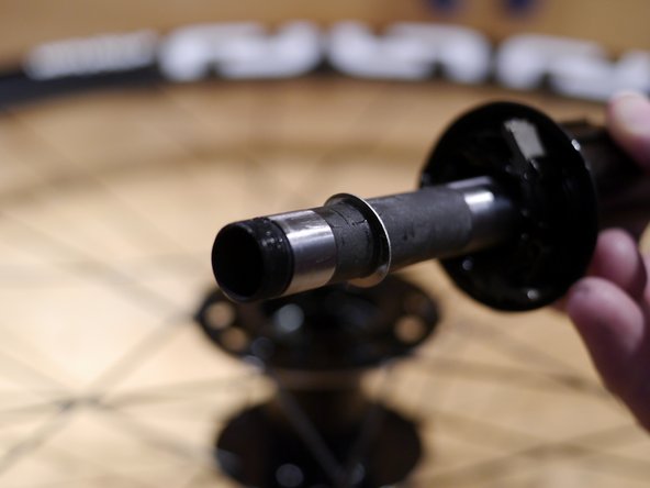 Slide the freehub shim onto the axle after the freehub body