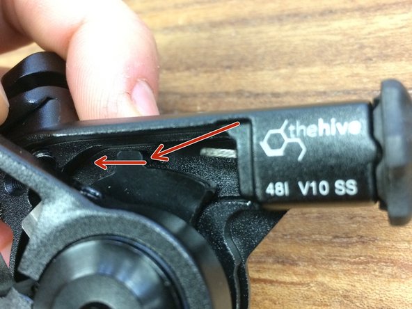 Slide the cable into the lever