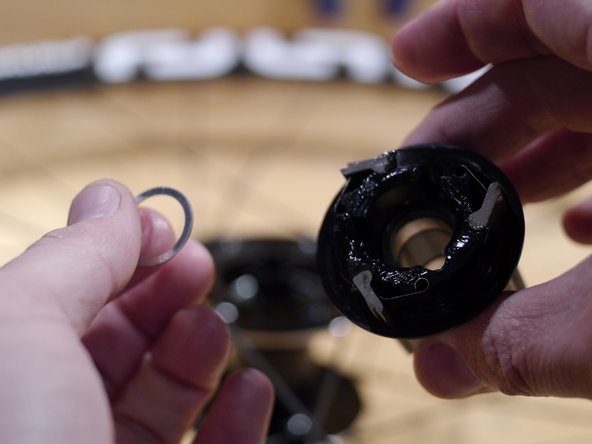 This is a thin washer. Be careful as sometimes this can stick to the inside of the freehub body or the bearing spacer