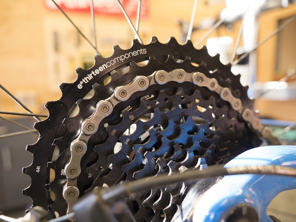 If only using one chain whip, leave the wheel on the bike and shift the chain into one of the aluminum sprockets.