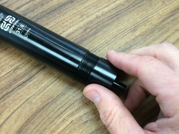 Clamp the post in soft jaws