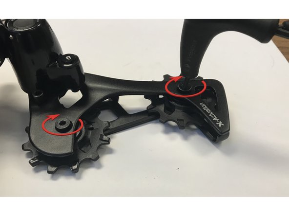 Tighten the two pulley screws to 4nm, or snug + 90 degrees.