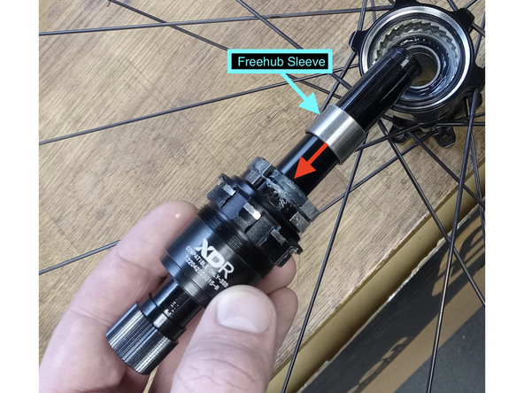 Slide the freehub spacer flush against freehub internals.