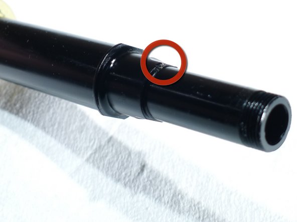 Use an axle vise or insert the flats on the drive side of the axle into a smooth jaw vise