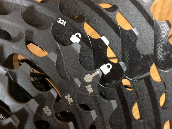 Line the key on the steel sprocket assembly up with the lock arrow on the aluminum cogs to ensure the two pieces are fully locked together.