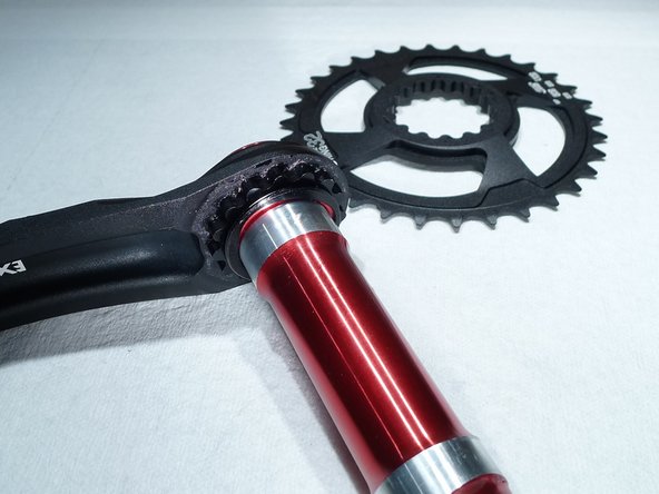 The spider or ring will fit snuggly on the crank arm splines, it can be helpful to rock it in order to free it from the arm