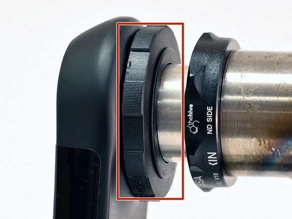 Notches on the outer ring should press up against the spring tang.