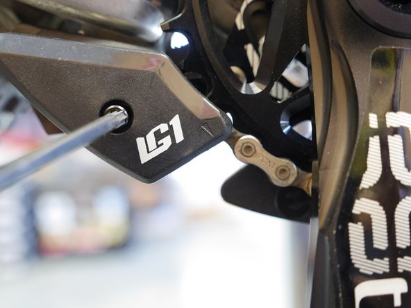 Thread the chain over the lower roller