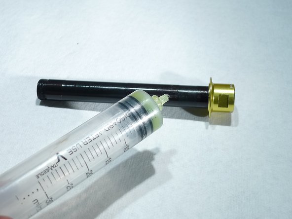 Lightly grease steel axle