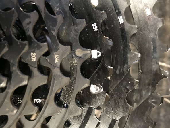 The steel portion of the cassette only installs in one position. Note the small tang on the steel piece needs to slide into the small clearance slot in the aluminum piece.