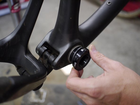 Install prescribed spacers on BB cup and thread into the frame