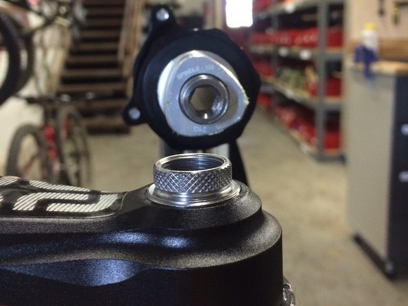 turn the 8mm hex counterclockwise