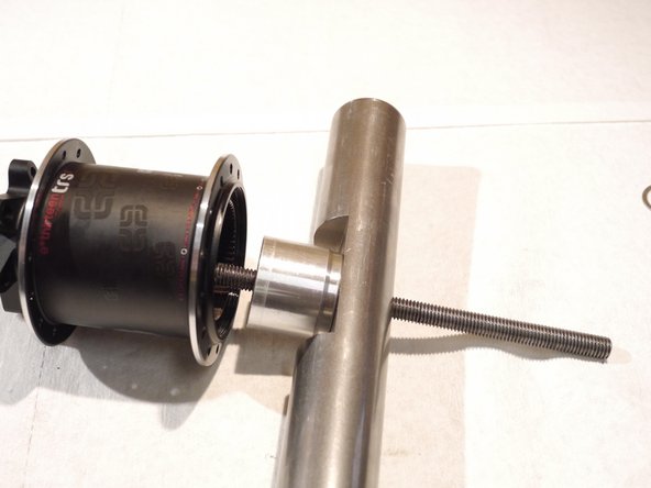 Leave the disc side bearing tool in place and remove the drive side too