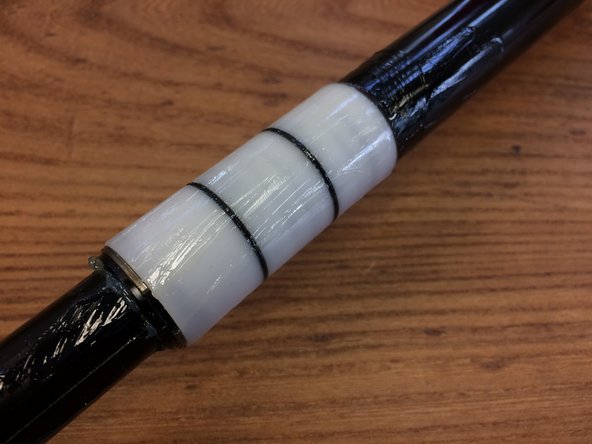 Lightly grease the bushings on the pillar/inner tube assembly