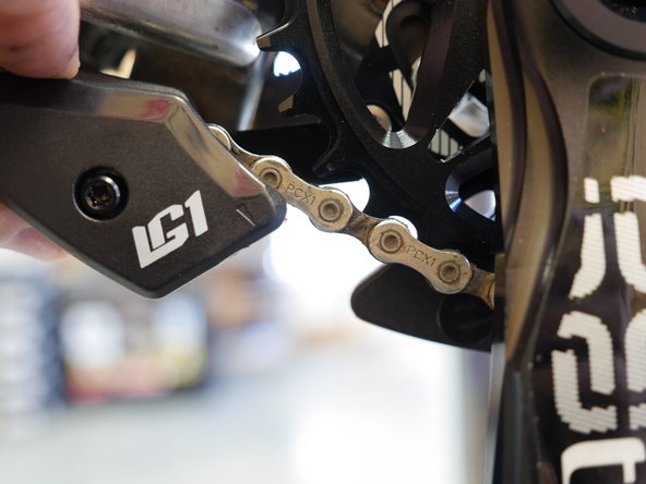 Rotate the lower slider closed