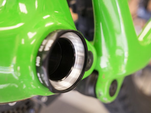 To install the new bearing, lightly grease the inside of the cup