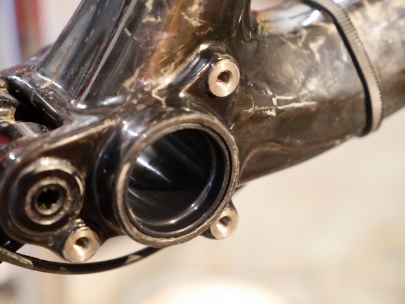 Extend the center tube so it is flush with the BB shell on the side without the BB installed