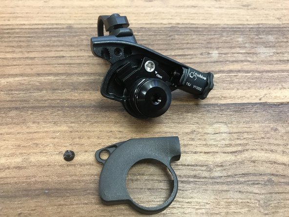 Loosen the 2mm cover screw and  remove the cover screw and cover