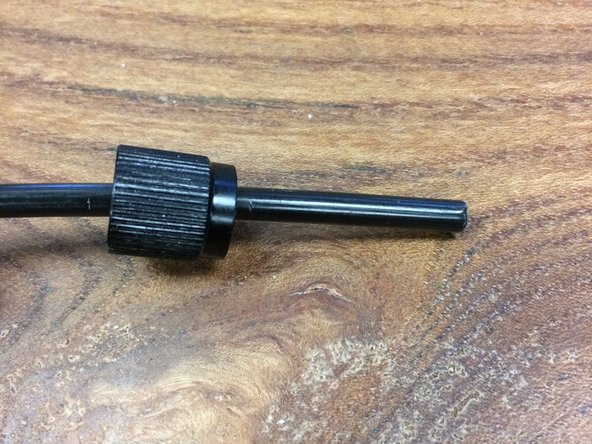 Slip the housing clamp nut over the housing