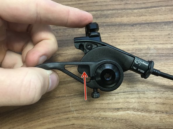 Install the paddle lever and install the fixing bolt