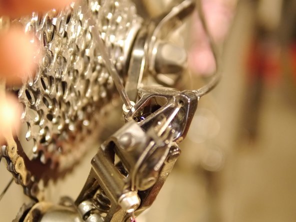 Remove the stock B-limit screw and install the new one