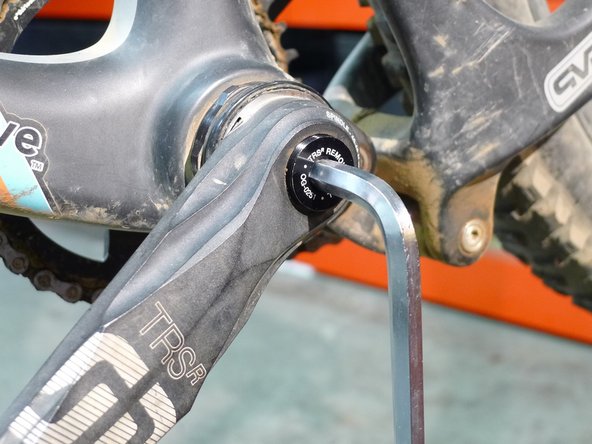 Once the tool is fully threaded in, pull sharply on the pedal end of the crankarm, this will release the crank arm
