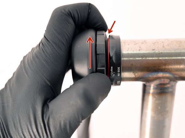 Activate the bearing preload by turning the APS adjuster counter-clockwise