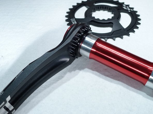 Thoroughly clean the splines on both the spider and arm