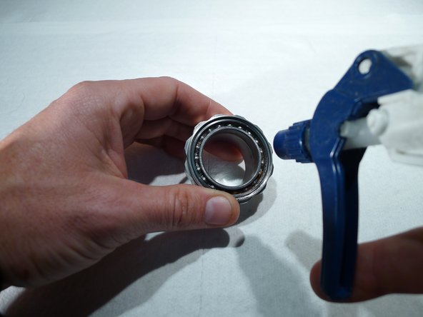 With the cartridge bearing seal removed, clean the bearing throughly