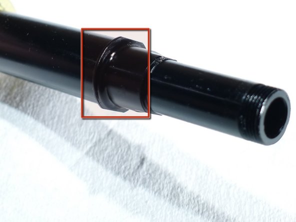 Use an axle vise or insert the flats on the drive side of the axle into a smooth jaw vise