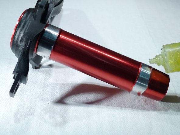 Lightly grease the crank spindle and install the appropriate spacers on the drive and non-drive side of the spindle