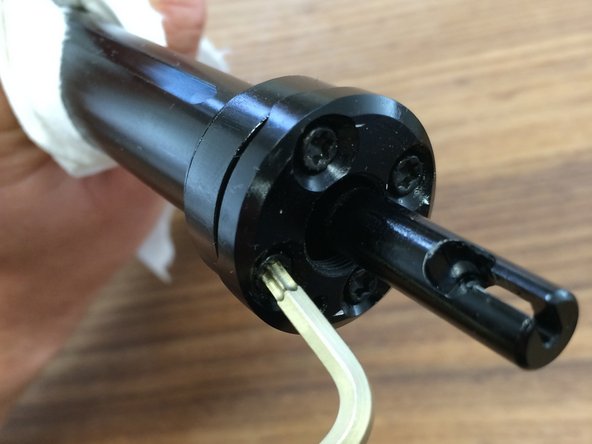 Put a small amount of threadlocker on each screw and tighten with a T15 Torx to 3N*m