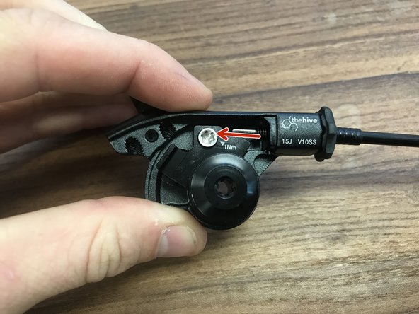 Slide the cable into the lever