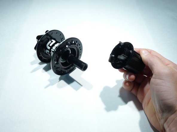 Be careful not to lose the pawls as they may fall while removing the freehub body