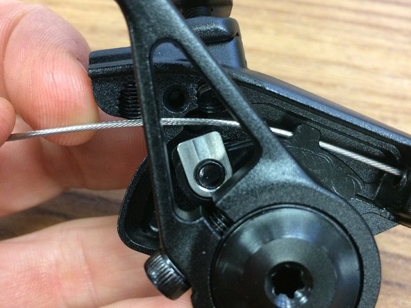 Pull cable through until it is tight