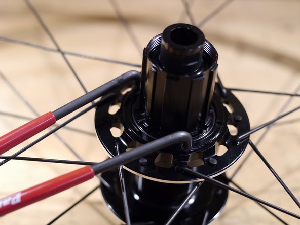 Put one drop of freehub oil on the rubber dust seal and install the freehub dust seal lockring