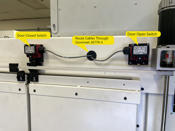 Now that the switches are mounted it is time to adjust them, but before you do route the cables through the grommet in the upper rail mounting plate. See Photo 1