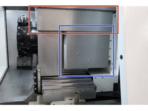 The highlighted covers must be removed to access the  locking mechanism for the turret.