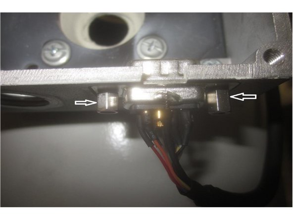 Install the D-sub connector and fan cable strain relief fitting to the junction box. The D-sub connects from the bottom where the box is relieved. Carefully tighten the jack screws and nuts. Note: The ground wire is attached to the side of the connector and faces out when re-installed.