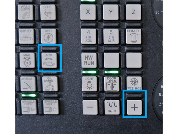 Make sure spindle is clear of ATC ARM before rotating the arm.