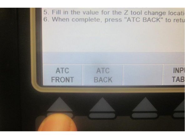 Place a tool holder in any of the tool locations. Jog X and Y to match the coordinating numbers for the selected tool location. Press the &quot;Orient on&quot; key. The spindle will orient to load a tool.
