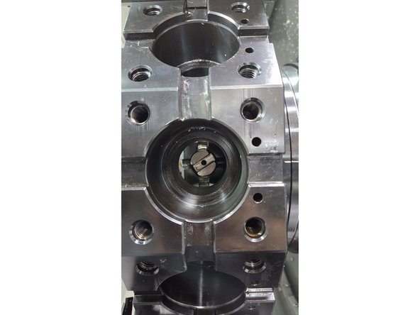 After the live tool spindle motor is reinstalled, commanding the spindle to 0 degree may no longer align it for live tool change.