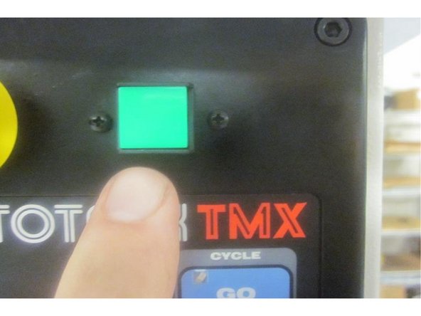 If performing a new machine installation, first remove the "red" shipping brackets attached to the X axis under the side sheet metal covers. Note: Brackets are found only on newer M11's.