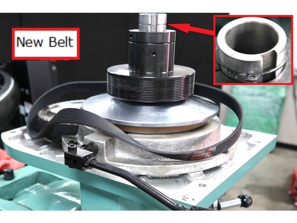 Add new spindle belt P/N 23597 . Replace the snap ring as shown by inset photo.